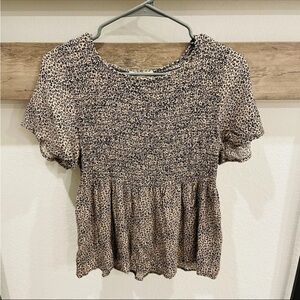 Urban romantics smocked leopard blouse